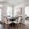 a dining room with a table and chairs