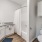 a bathroom with a tub sink and toilet